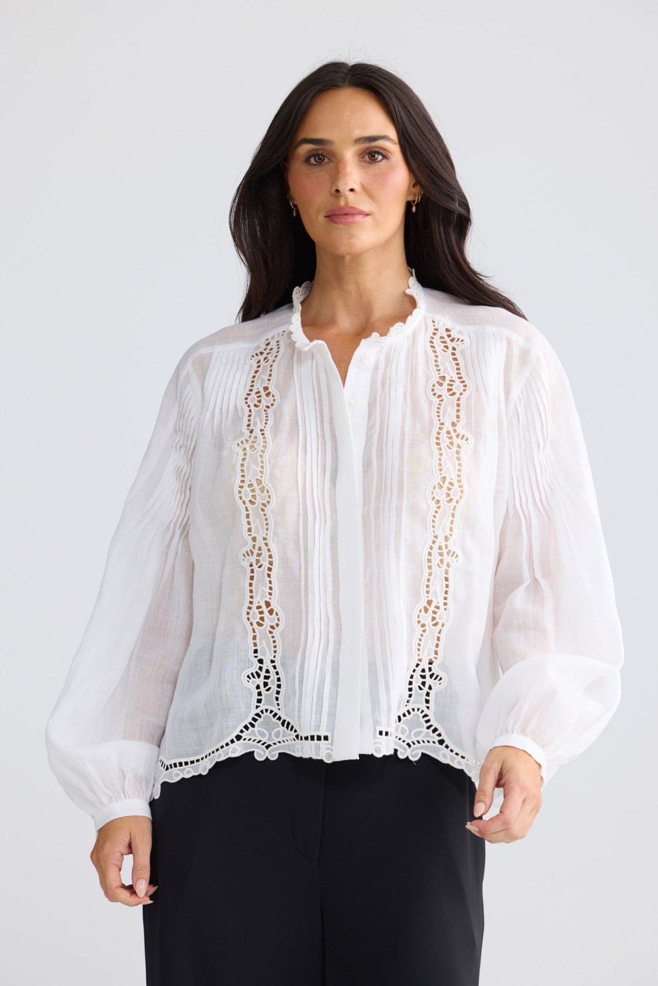 Model wearing Jenson Shirt in white by Brave + True, front view showing embroidery.