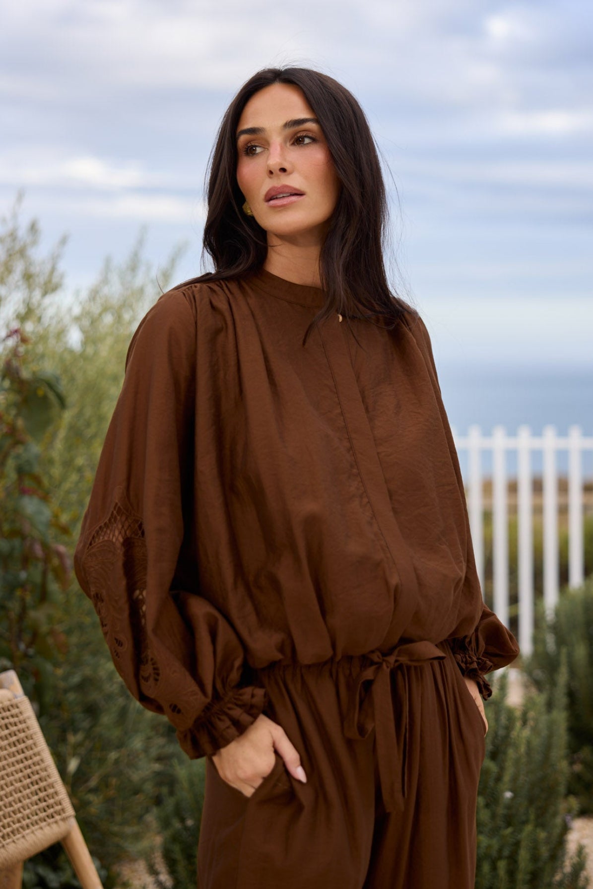 Model styling Tiana Shirt in Bronze by Brave + True, campaign lifestyle look.