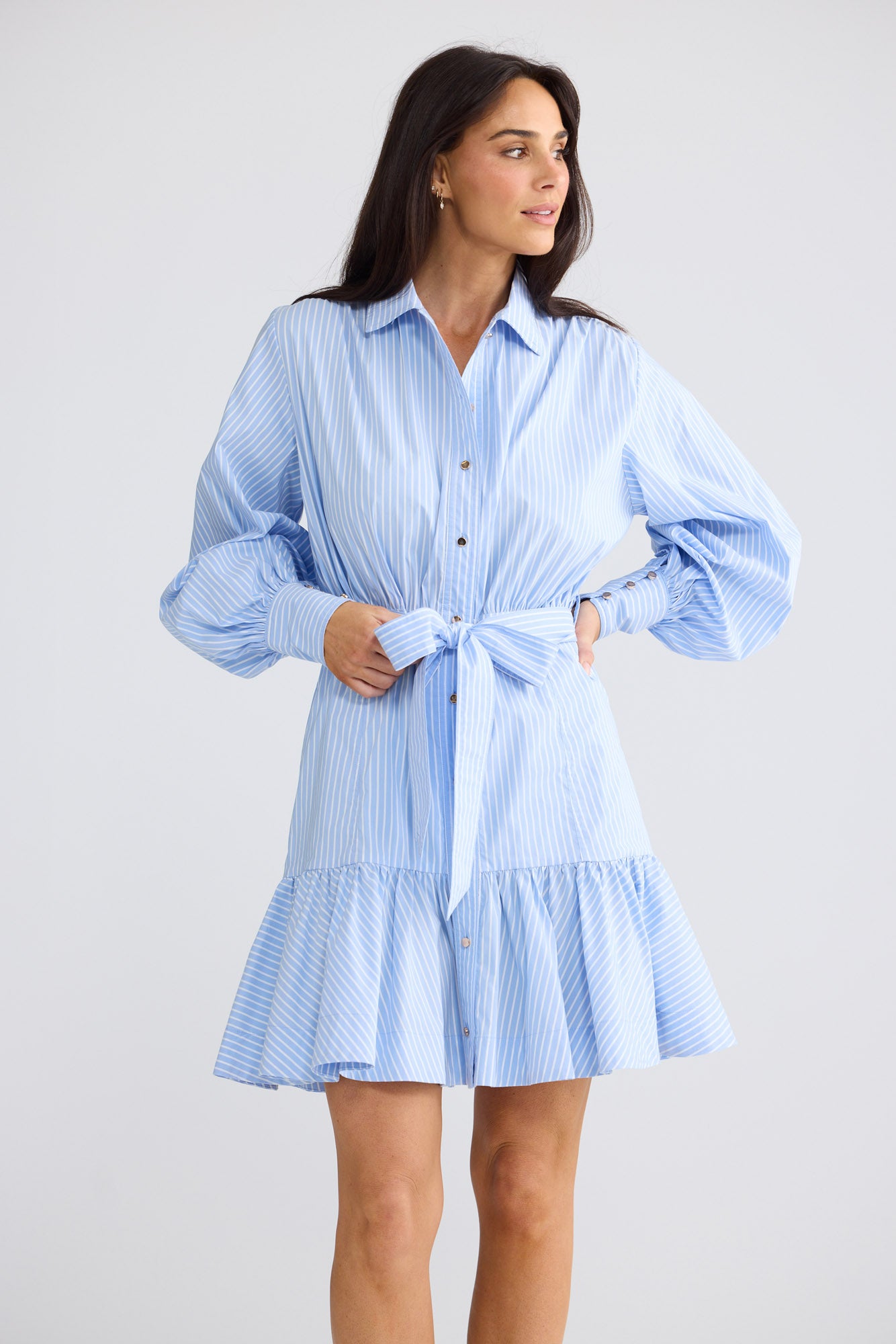 Model wearing Everett Dress in Glacier Stripe by Brave + True, view 3.