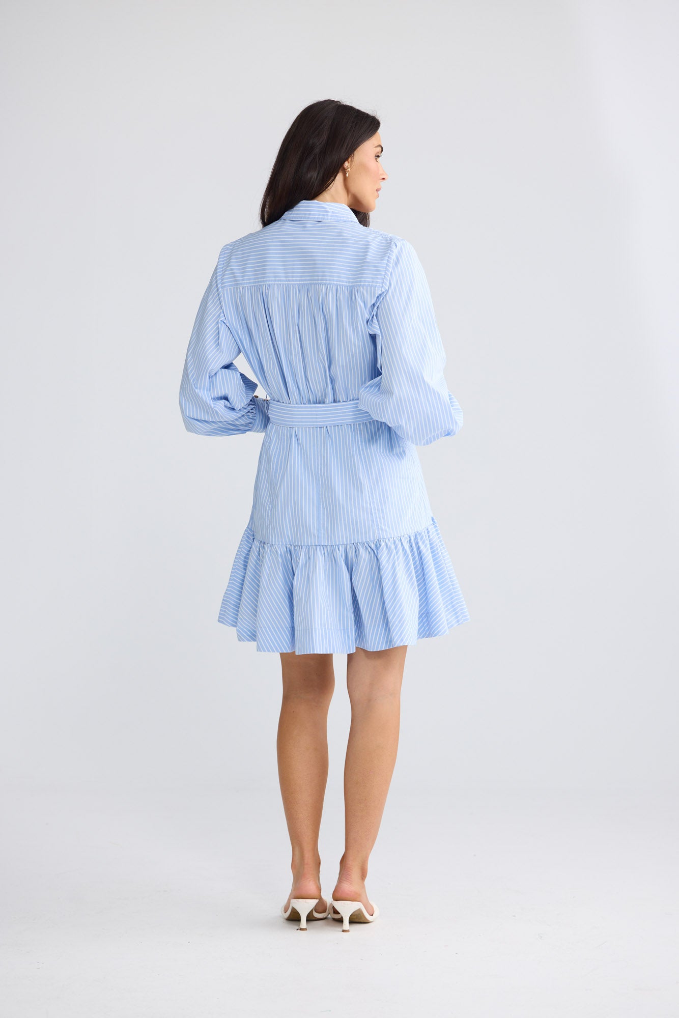Model wearing Everett Dress in Glacier Stripe by Brave + True, view 2.