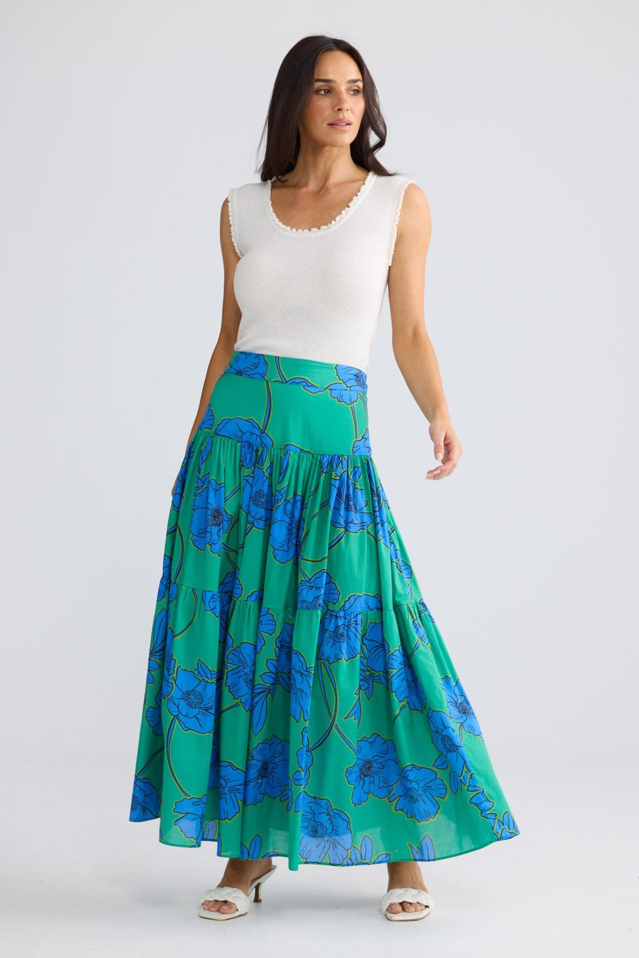 Model wearing Heather Skirt in Bloomsbury Floral print by Brave + True, front view.