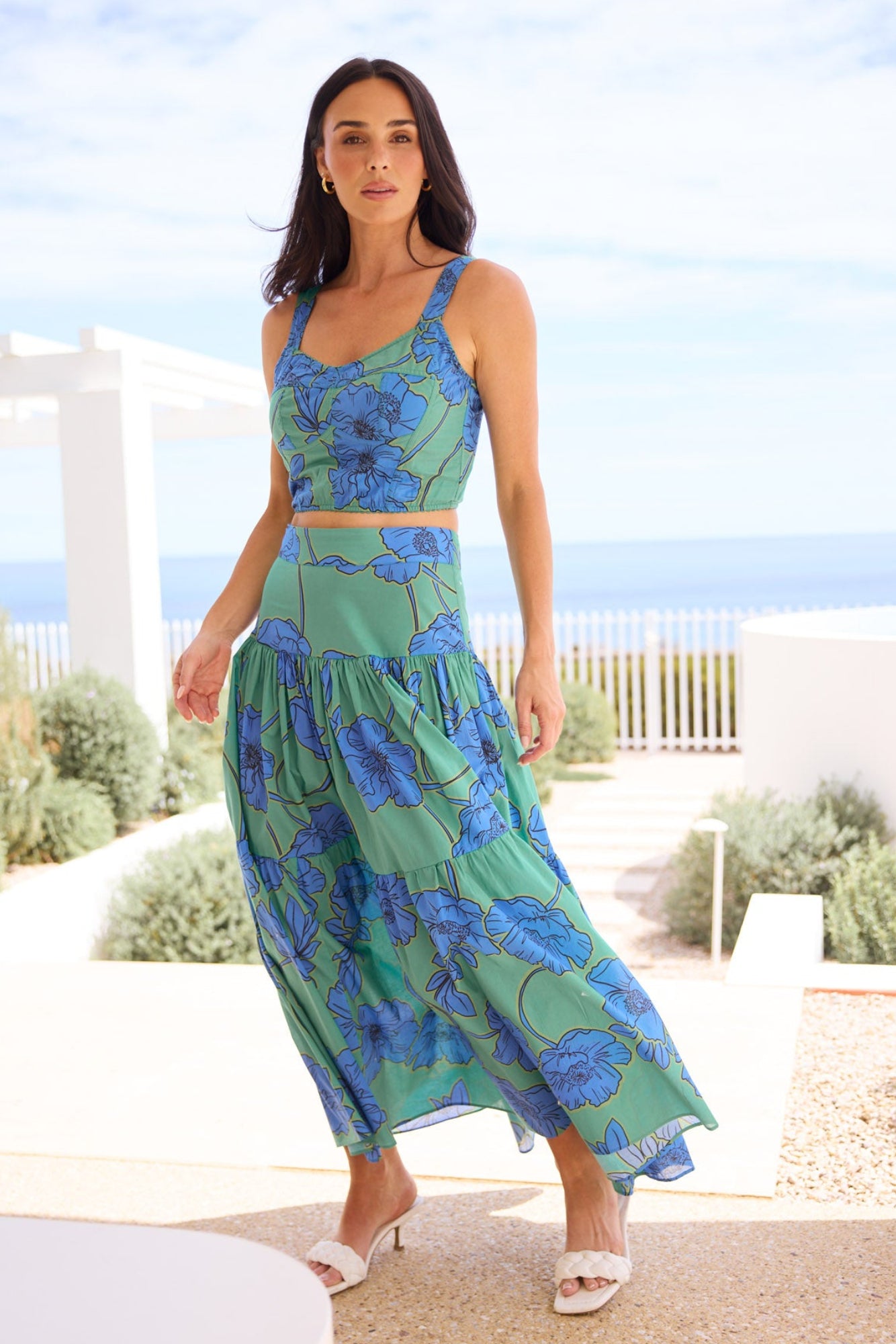 Model styling Heather Skirt in Bloomsbury Floral by Brave + True, campaign lifestyle look.