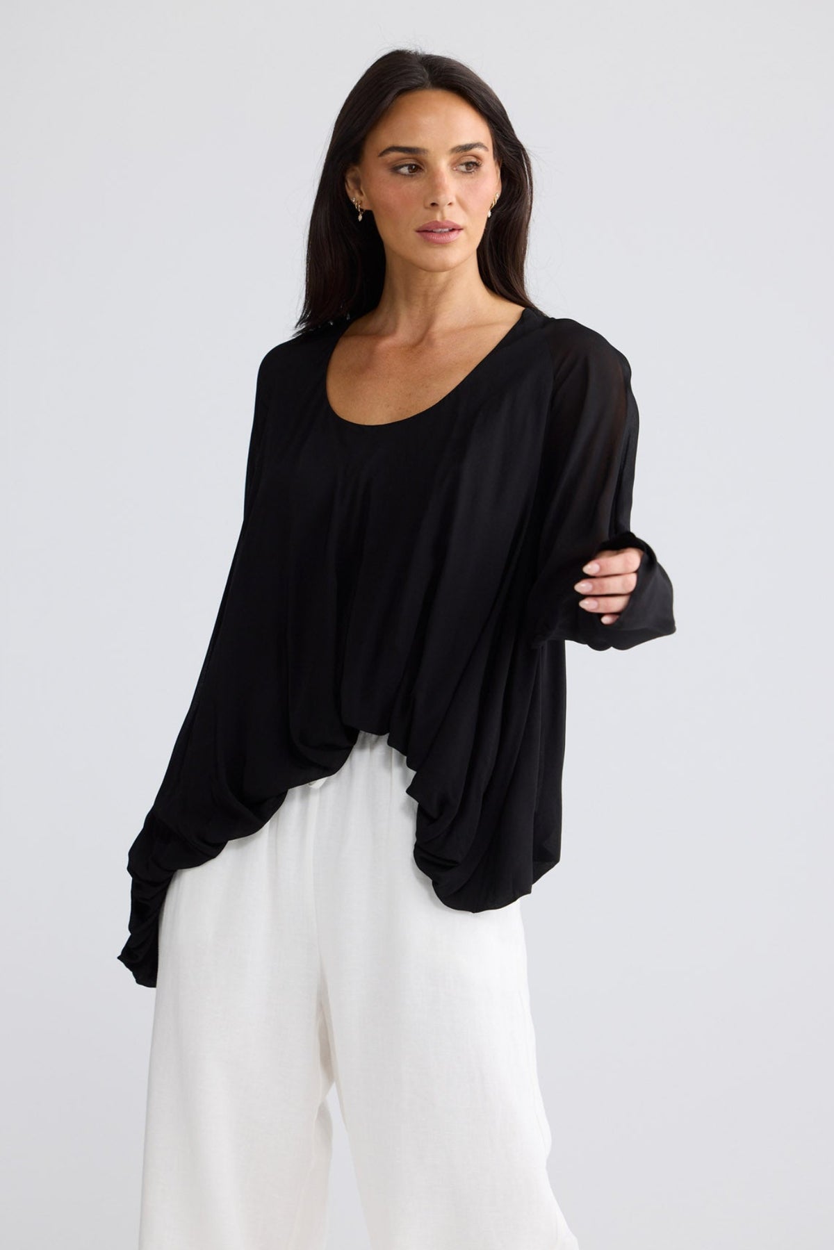 Model wearing Melissa Top in Black by Brave + True, view 3.