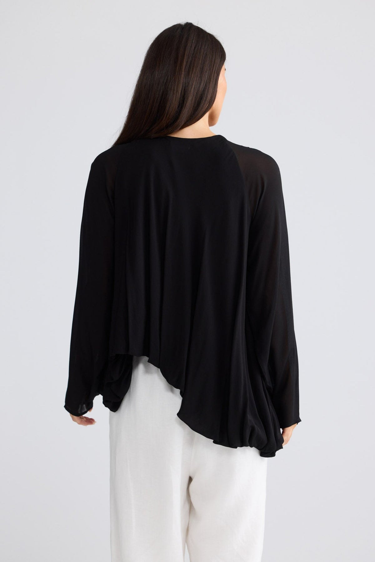 Model wearing Melissa Top in Black by Brave + True, view 4.