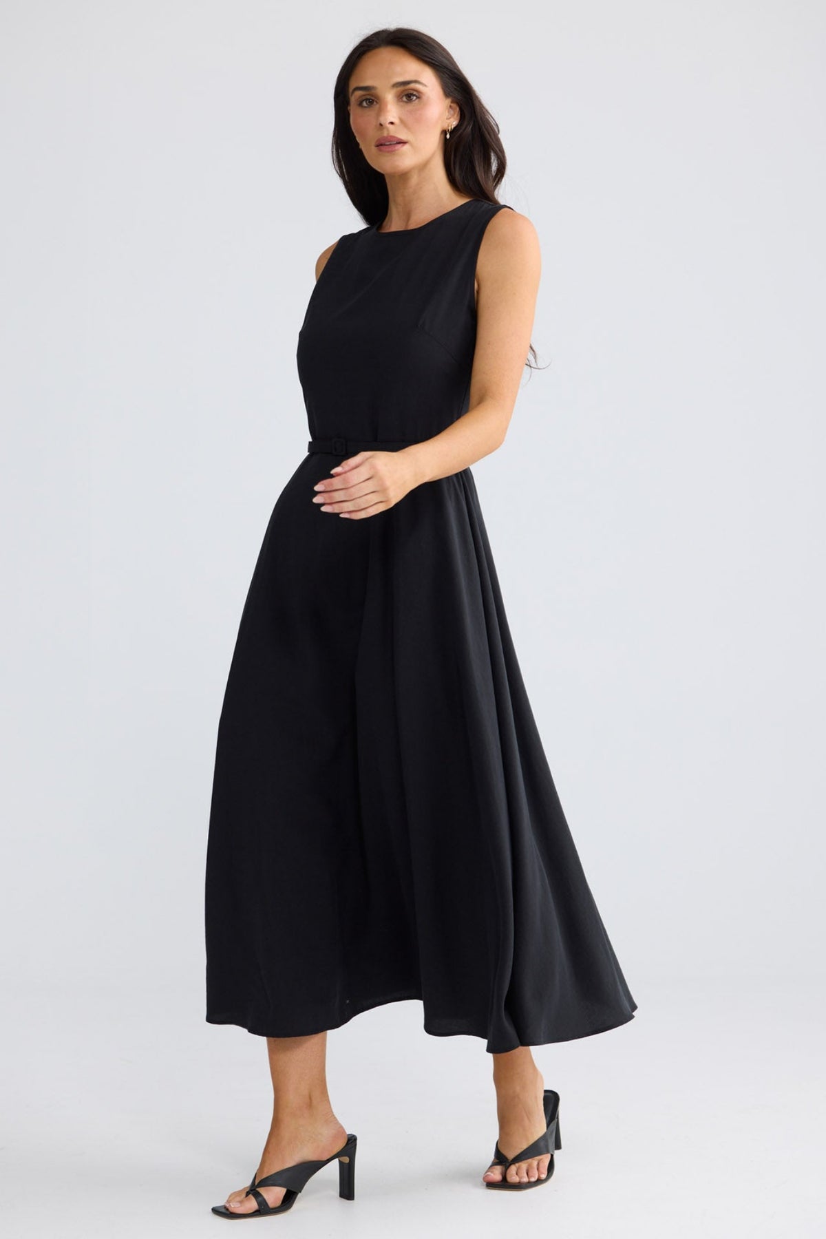 Model wearing Ren Midi Dress in Black by Brave + True, view 3.