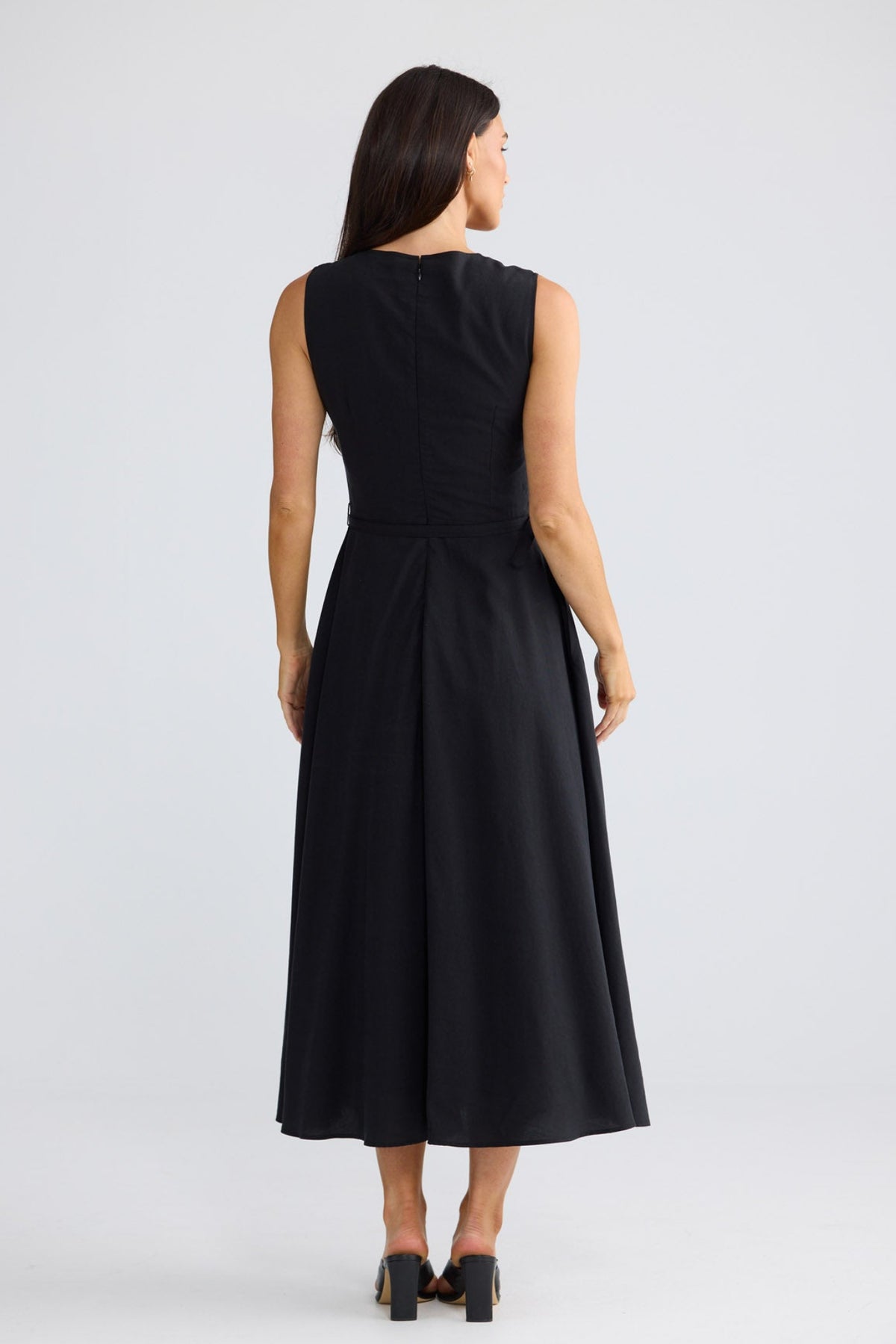 Model wearing Ren Midi Dress in Black by Brave + True, view 5.
