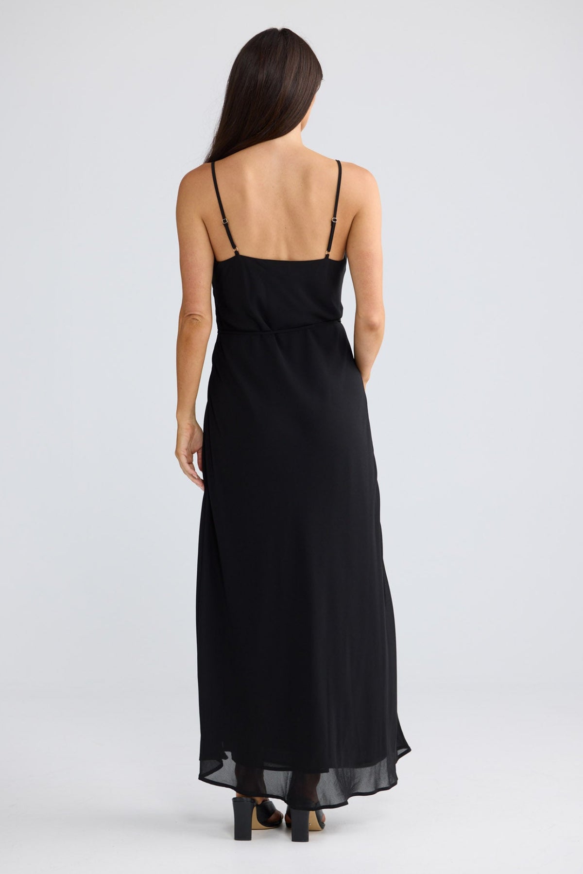 Model wearing Elsbeth Maxi Dress in Black by Brave + True, view 4.