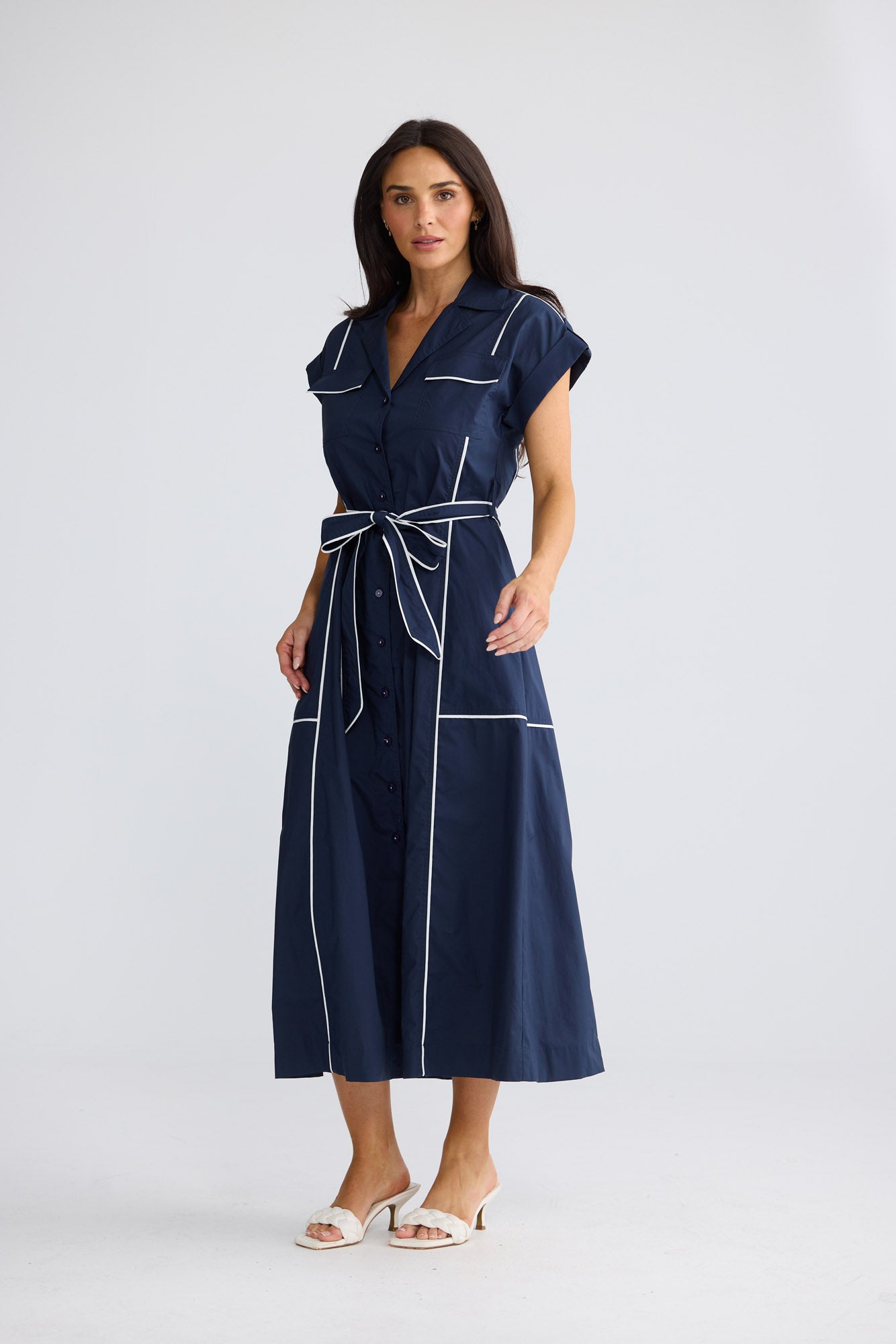 Model wearing Portia Dress in Navy W White by Brave + True, view 3.