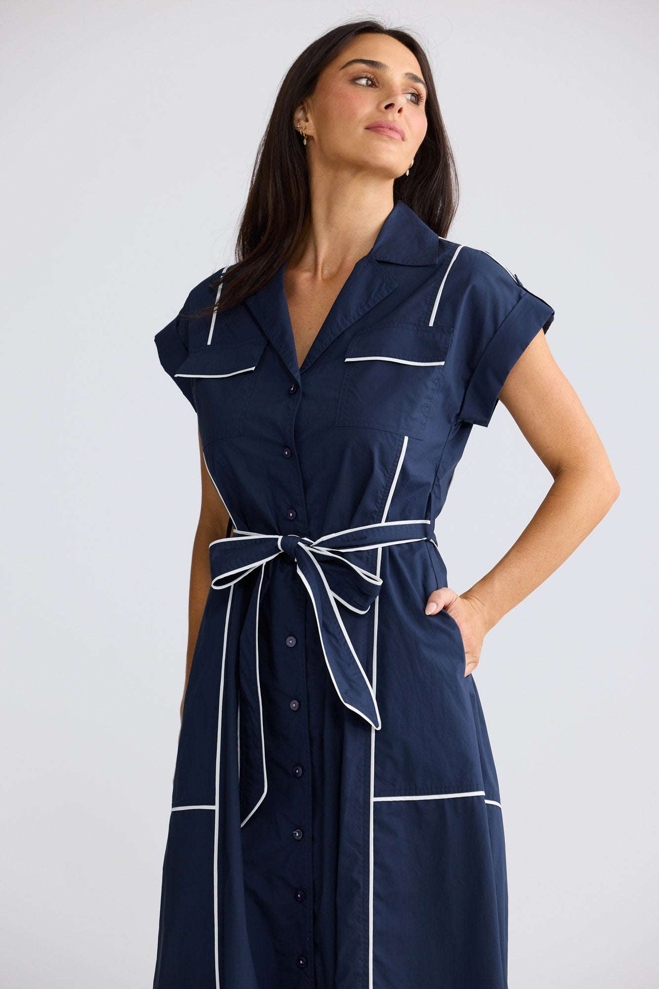Model wearing Portia Dress in Navy W White by Brave + True, view 5.