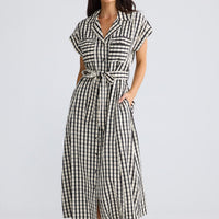 Model wearing Portia Dress in Black Gingham by Brave + True, view 3.