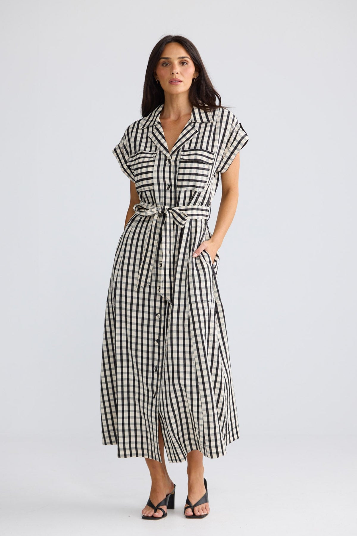 Model wearing Portia Dress in Black Gingham by Brave + True, view 3.