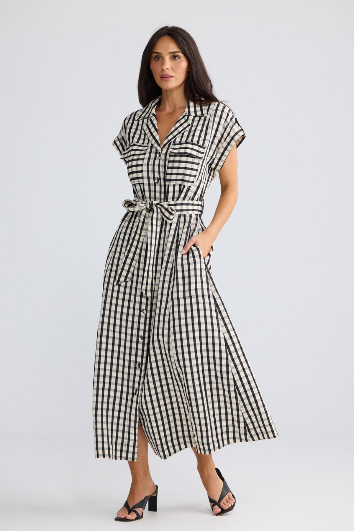 Model wearing Portia Dress in Black Gingham by Brave + True, view 4.