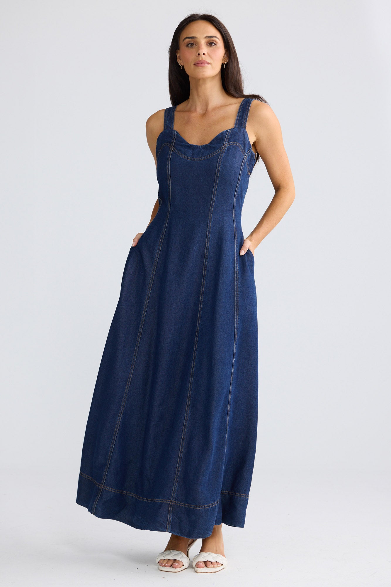 Model wearing Heather Dress in Indigo by Brave + True, view 4.