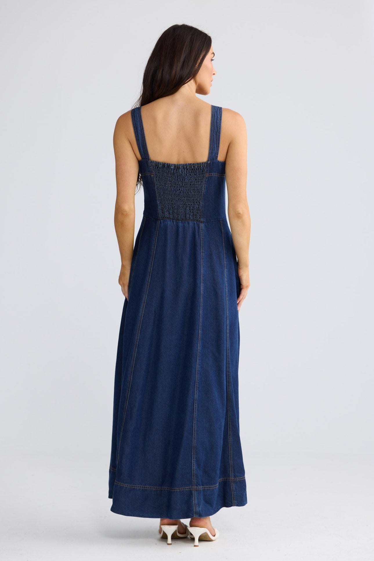 Model wearing Heather Dress in Indigo by Brave + True, view 2.