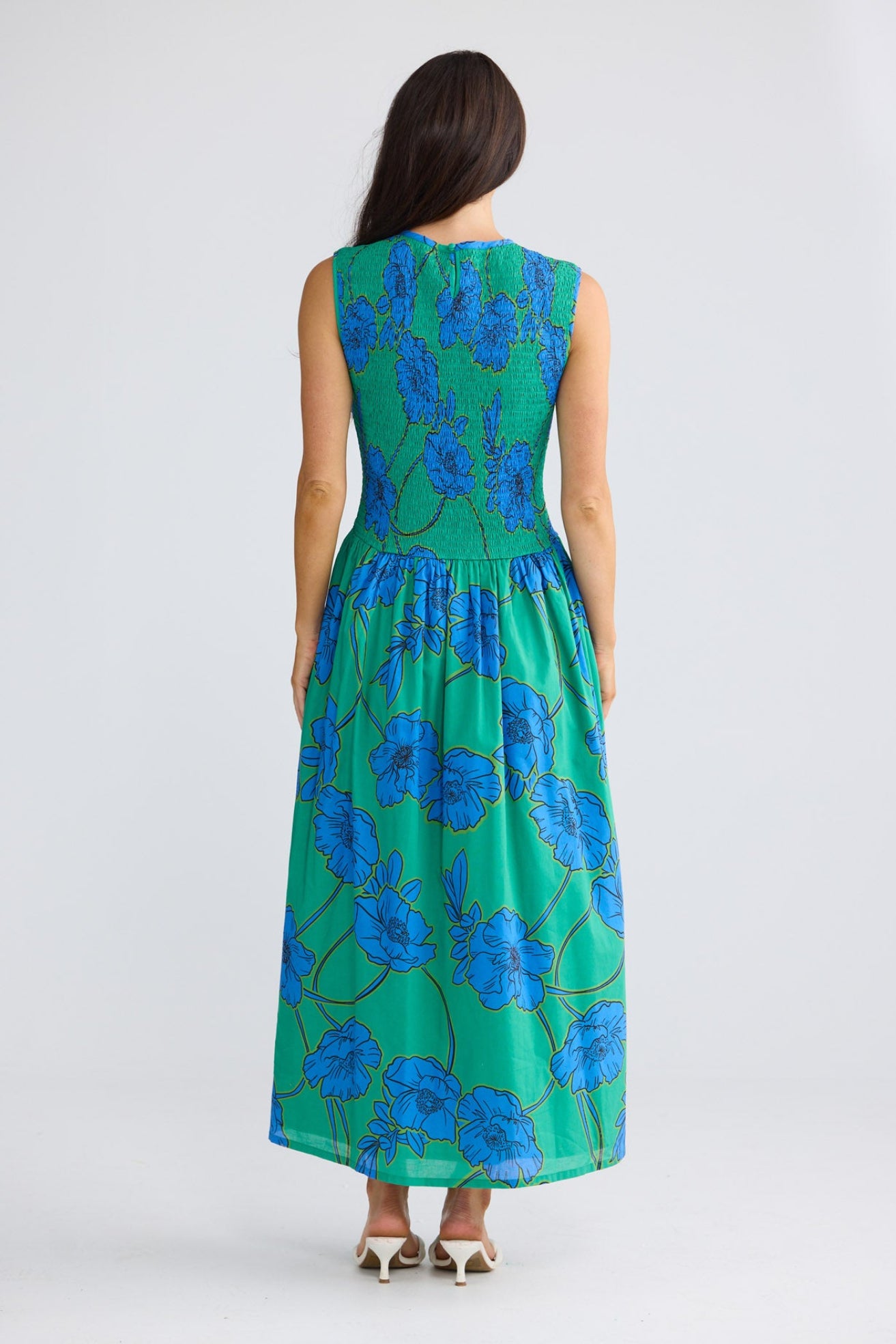 Model wearing Addison Dress in Bloomsbury Floral print by Brave + True, front view.