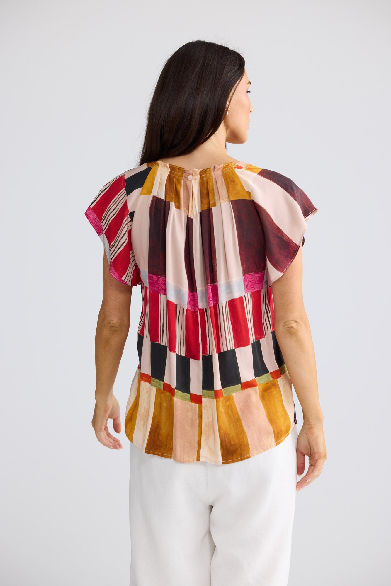 Model wearing Boulevard Top in Painterly Geo by Brave + True, view 4.