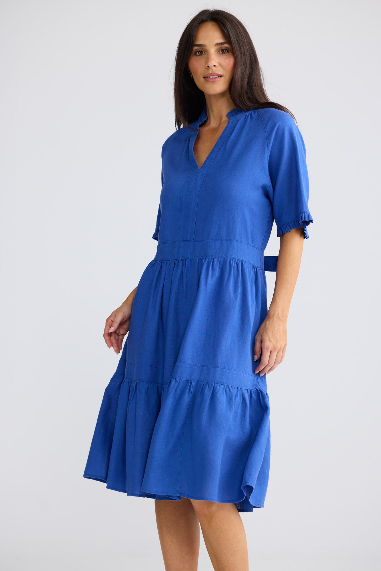 Model wearing Soiree Dress in Cobalt by Brave + True, view 4.