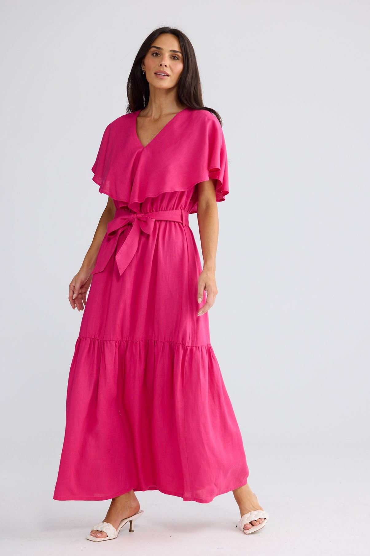 Model wearing Long Way Home Dress in Fuchsia by Brave + True, view 4.