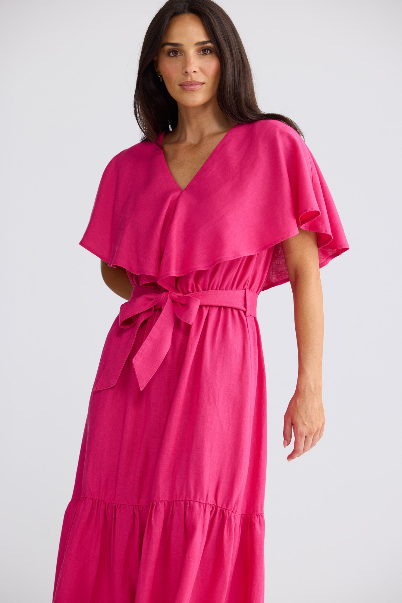 Model wearing Long Way Home Dress in Fuchsia by Brave + True, view 3.