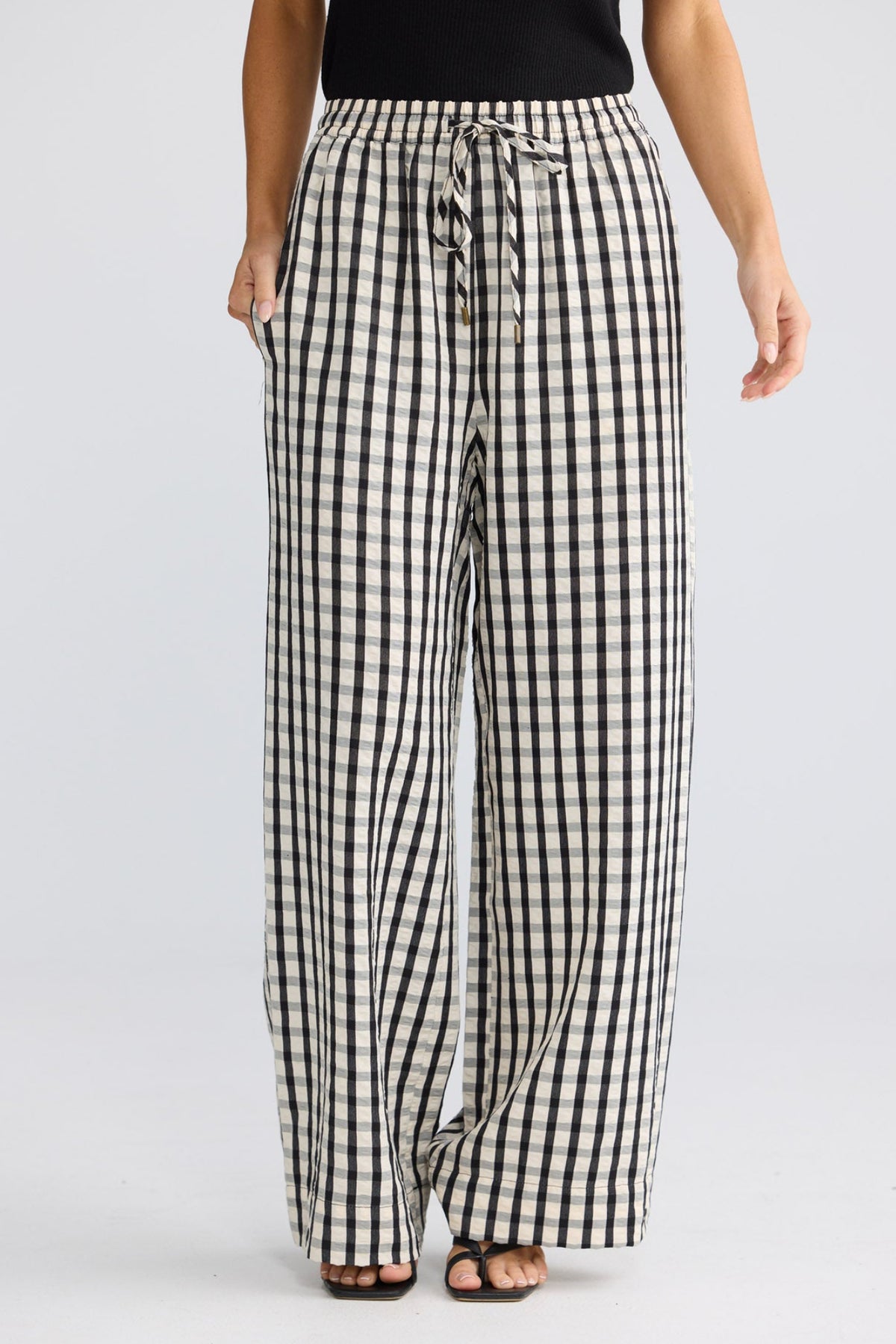Model wearing Jude Pant in Black Gingham by Brave + True, view 4.