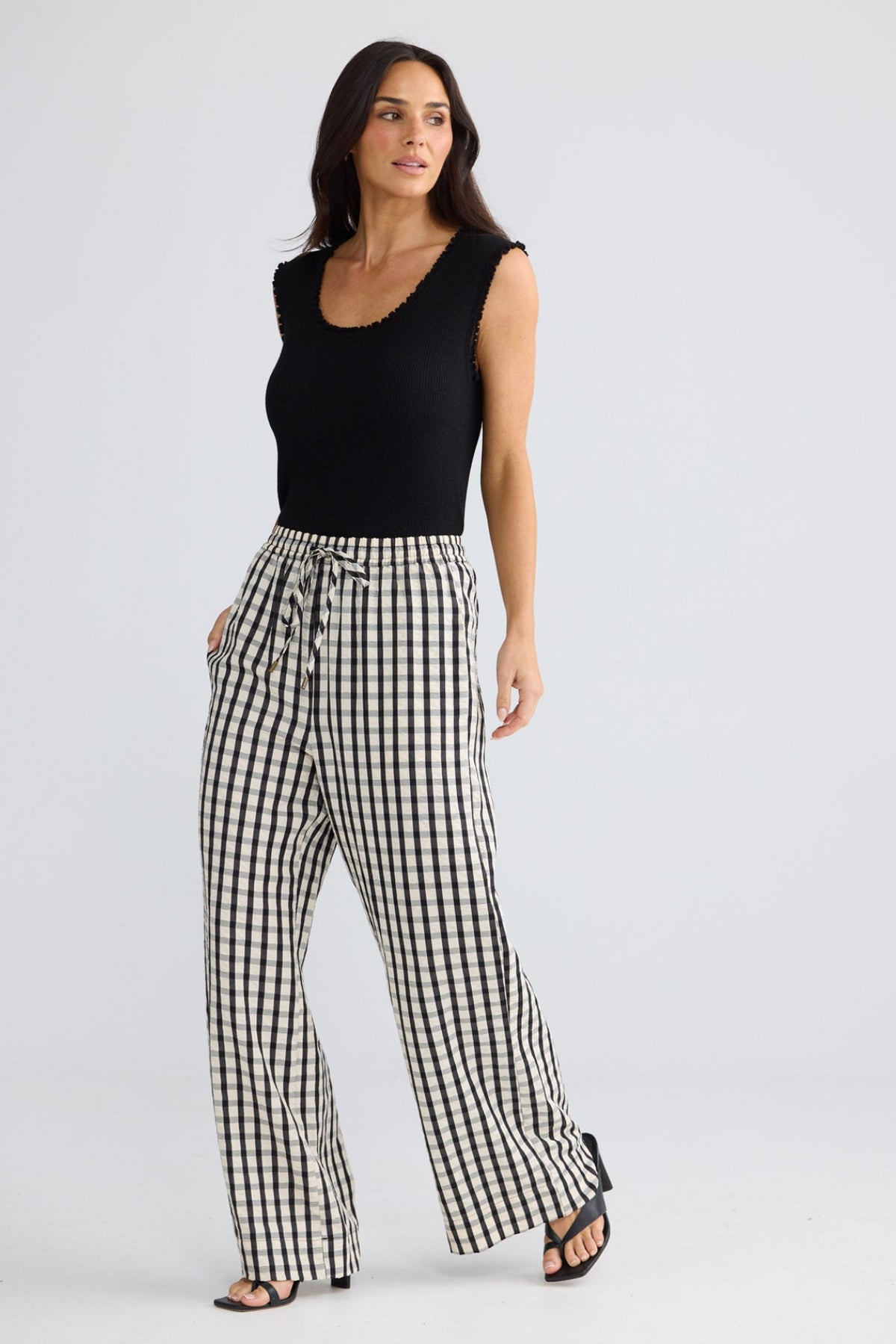Model wearing Jude Pant in Black Gingham by Brave + True, view 2.