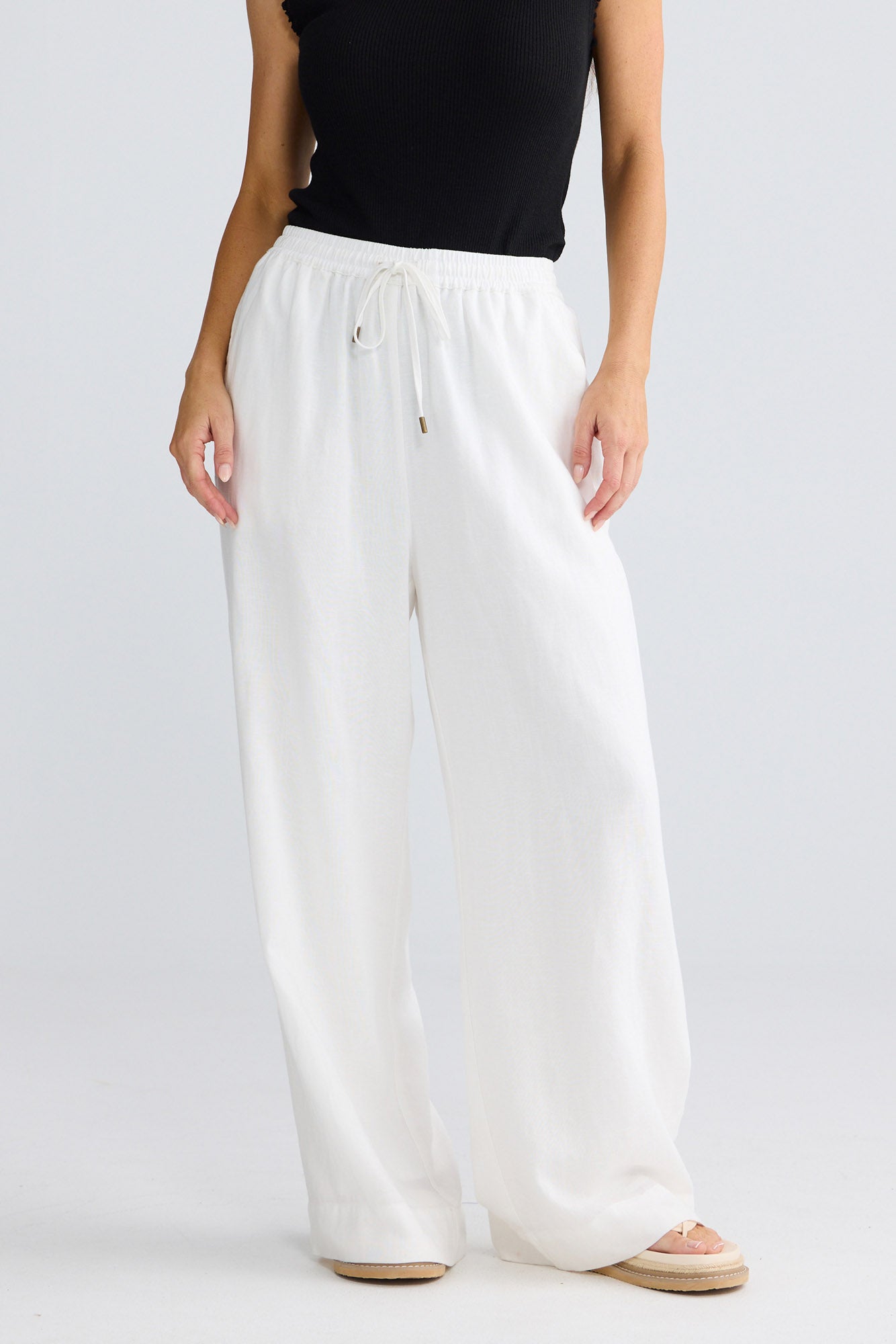 Model wearing Jude Pant in White by Brave + True, view 4.