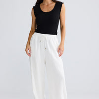 Model wearing Jude Pant in White by Brave + True, view 3.
