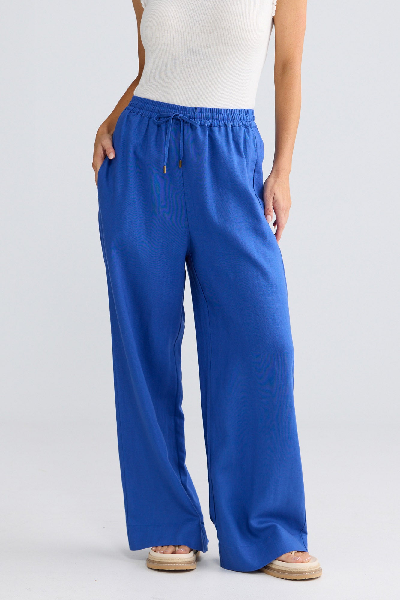 Model wearing Jude Pant in Cobalt by Brave + True, view 2.