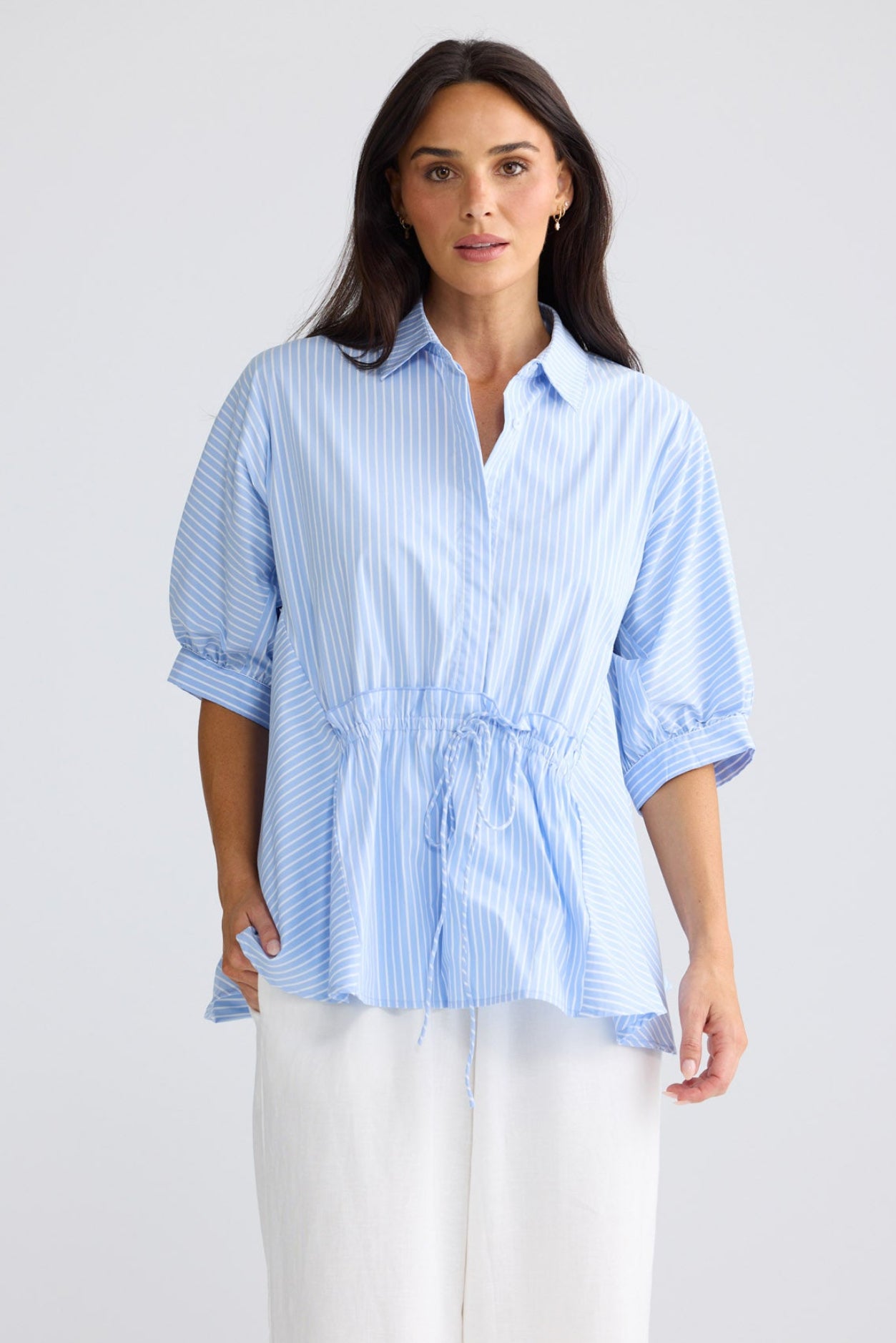 Model wearing Wonderland Top in Glacier Stripe by Brave + True, view 2.