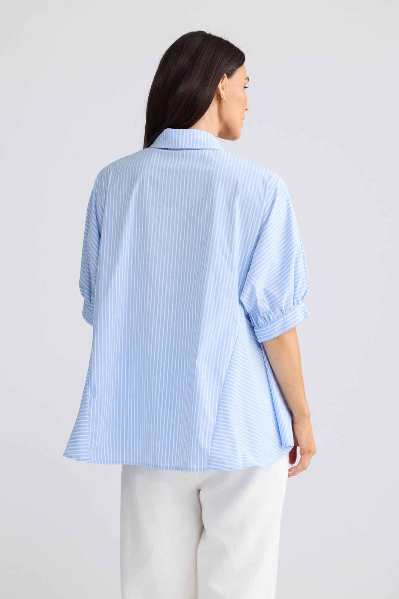 Model wearing Wonderland Top in Glacier Stripe by Brave + True, view 3.