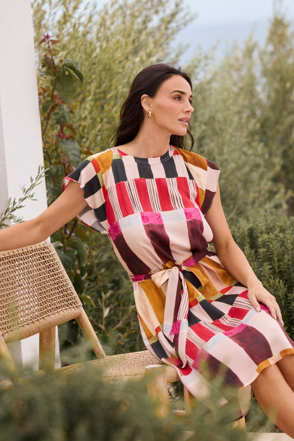 Model styling Boulevard Short Dress in Painterly Geo by Brave + True, campaign lifestyle look 2.