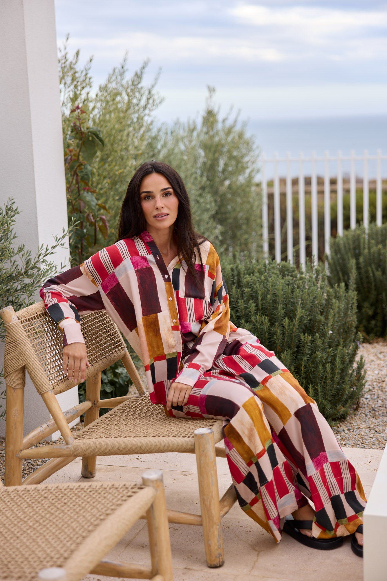Model styling Glenda Shirt in Painterly Geo by Brave + True, campaign lifestyle look.