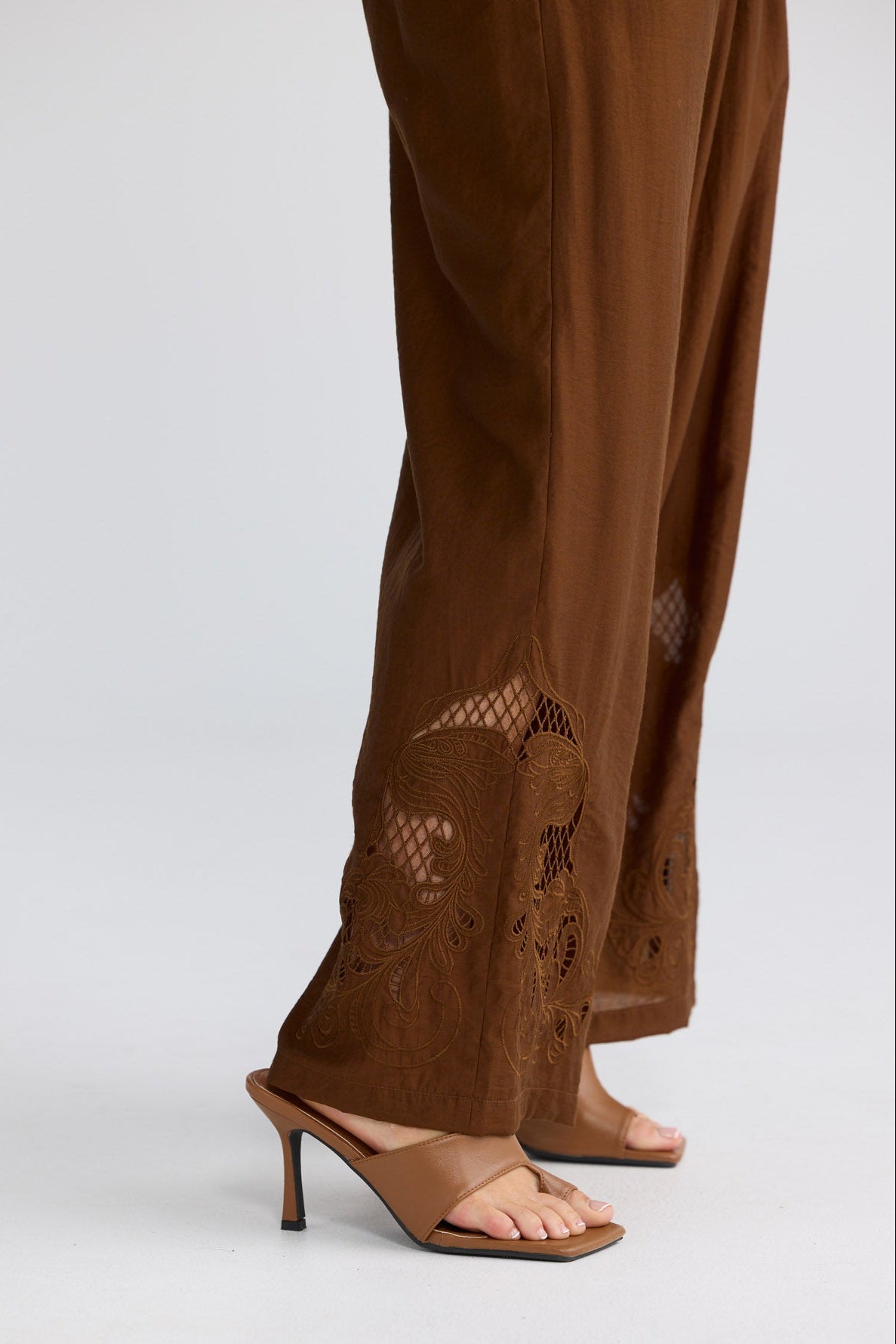 Model wearing Astrid Pant in Bronze by Brave + True, view 2.
