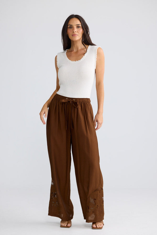 Model wearing Astrid Pant in Bronze by Brave + True, view 3.