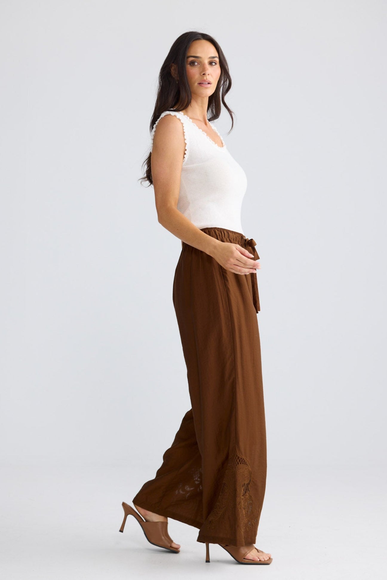 Model wearing Astrid Pant in Bronze by Brave + True, view 4.