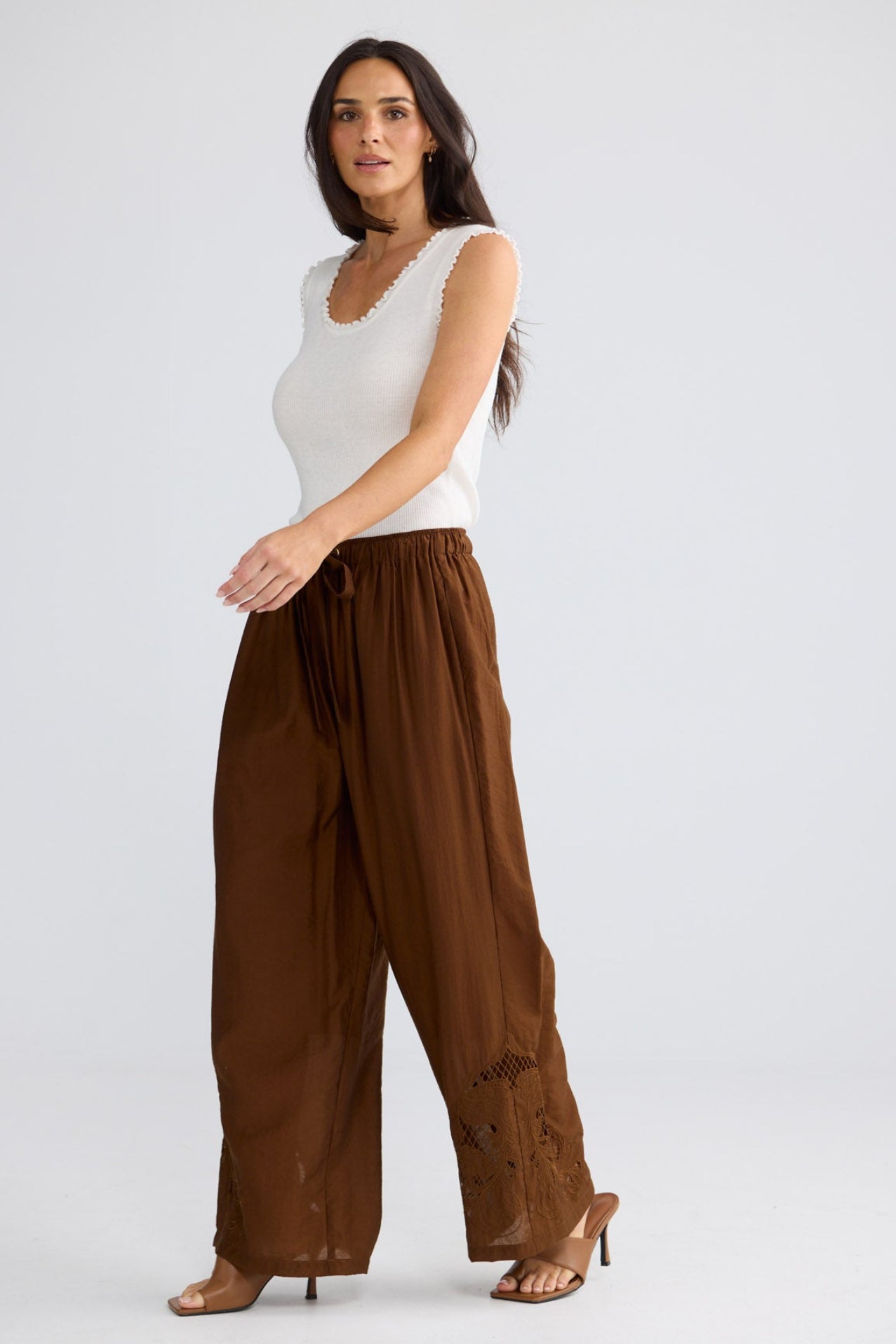Model wearing Astrid Pant in Bronze by Brave + True, view 5.