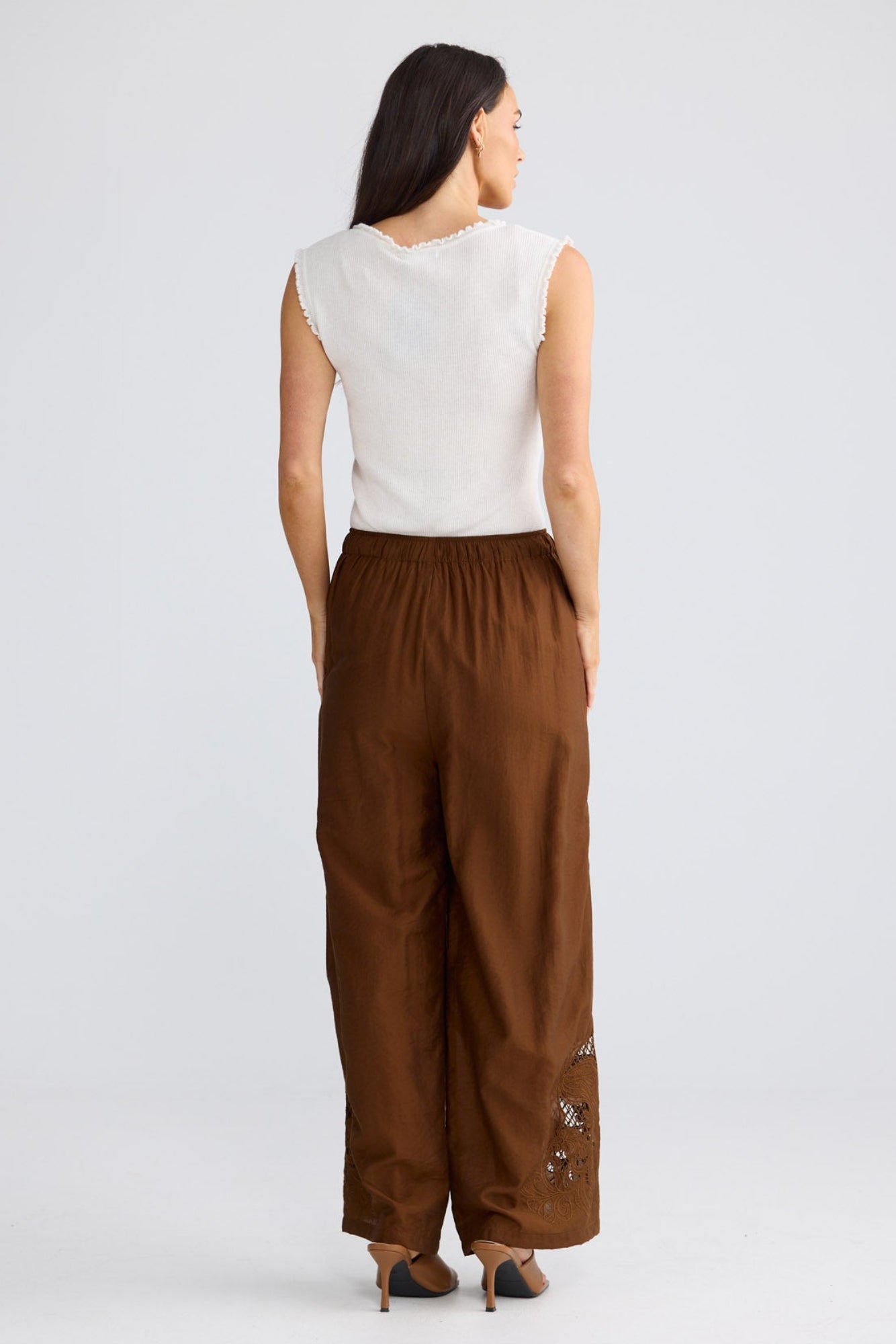 Model wearing Astrid Pant in Bronze by Brave + True, view 6.