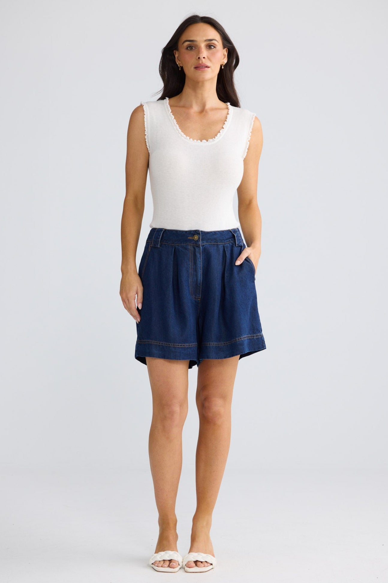 Model wearing Barrymore Short in indigo by Brave + True, front view showing wide-leg shorts.