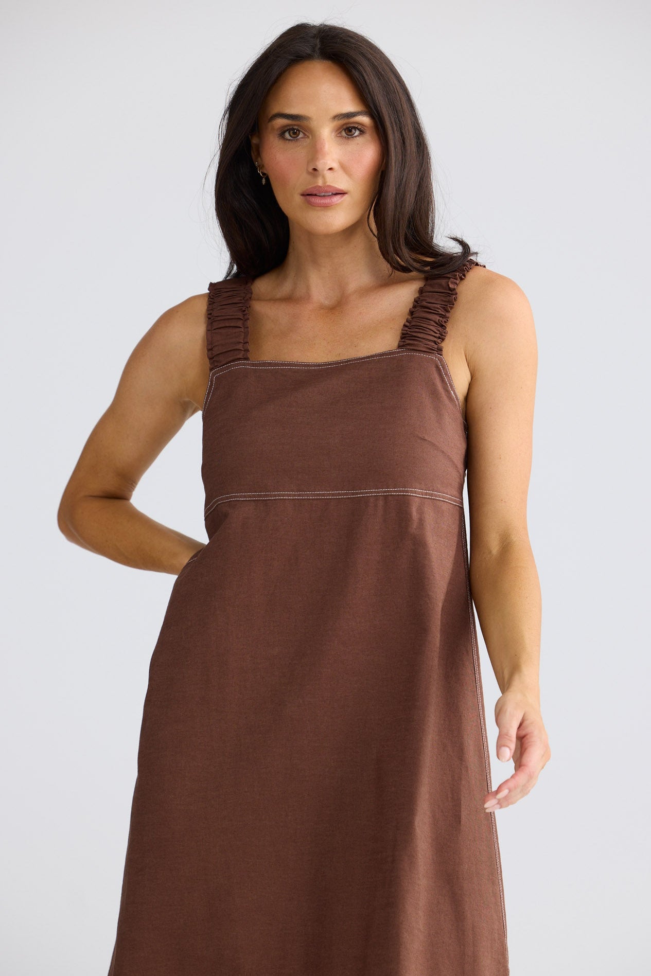 Model wearing Megan Dress in Coffee by Brave + True, view 2.