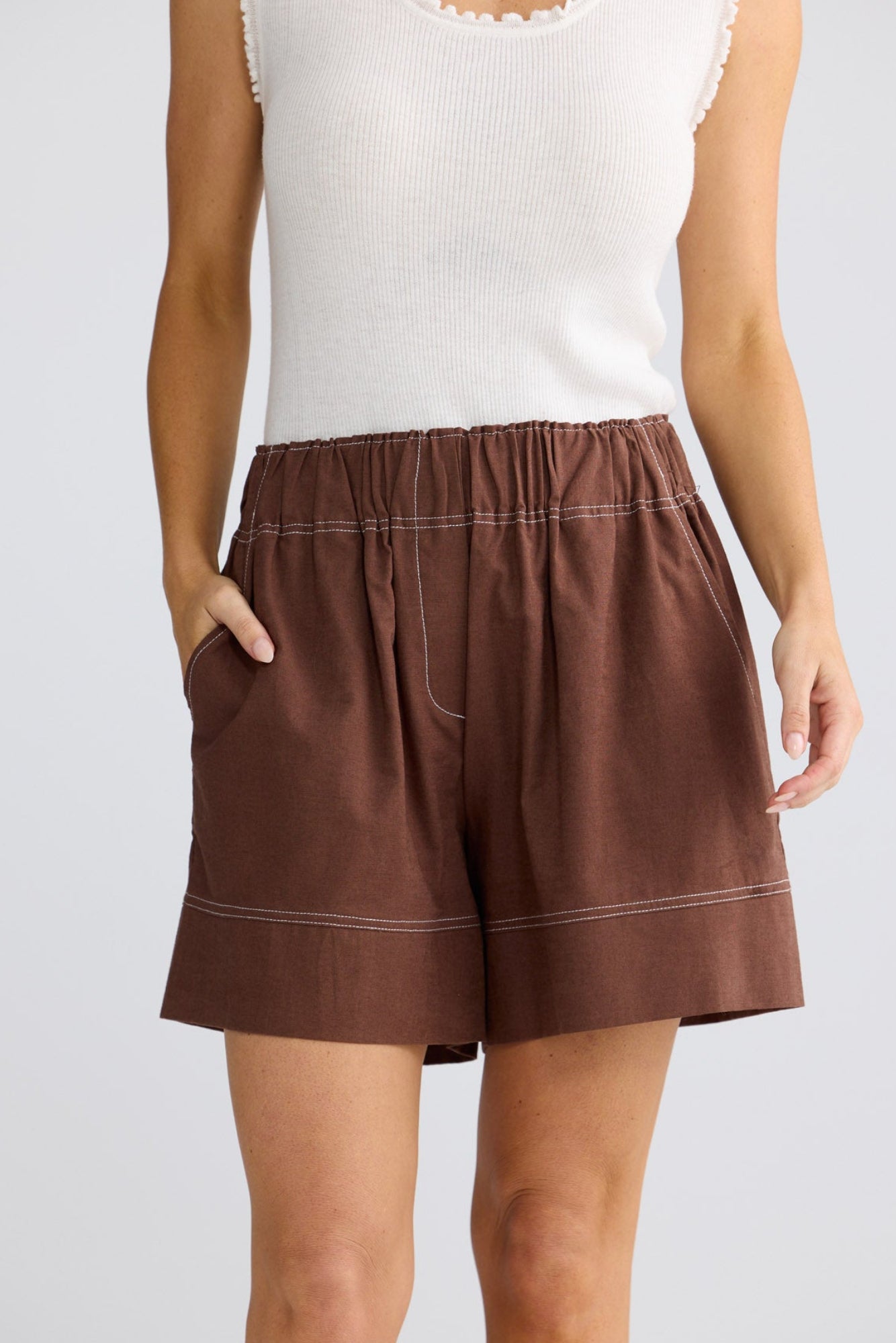 Model wearing Esplanade Short in Coffee by Brave + True, view 4.