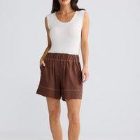 Model wearing Esplanade Short in Coffee by Brave + True, view 2.