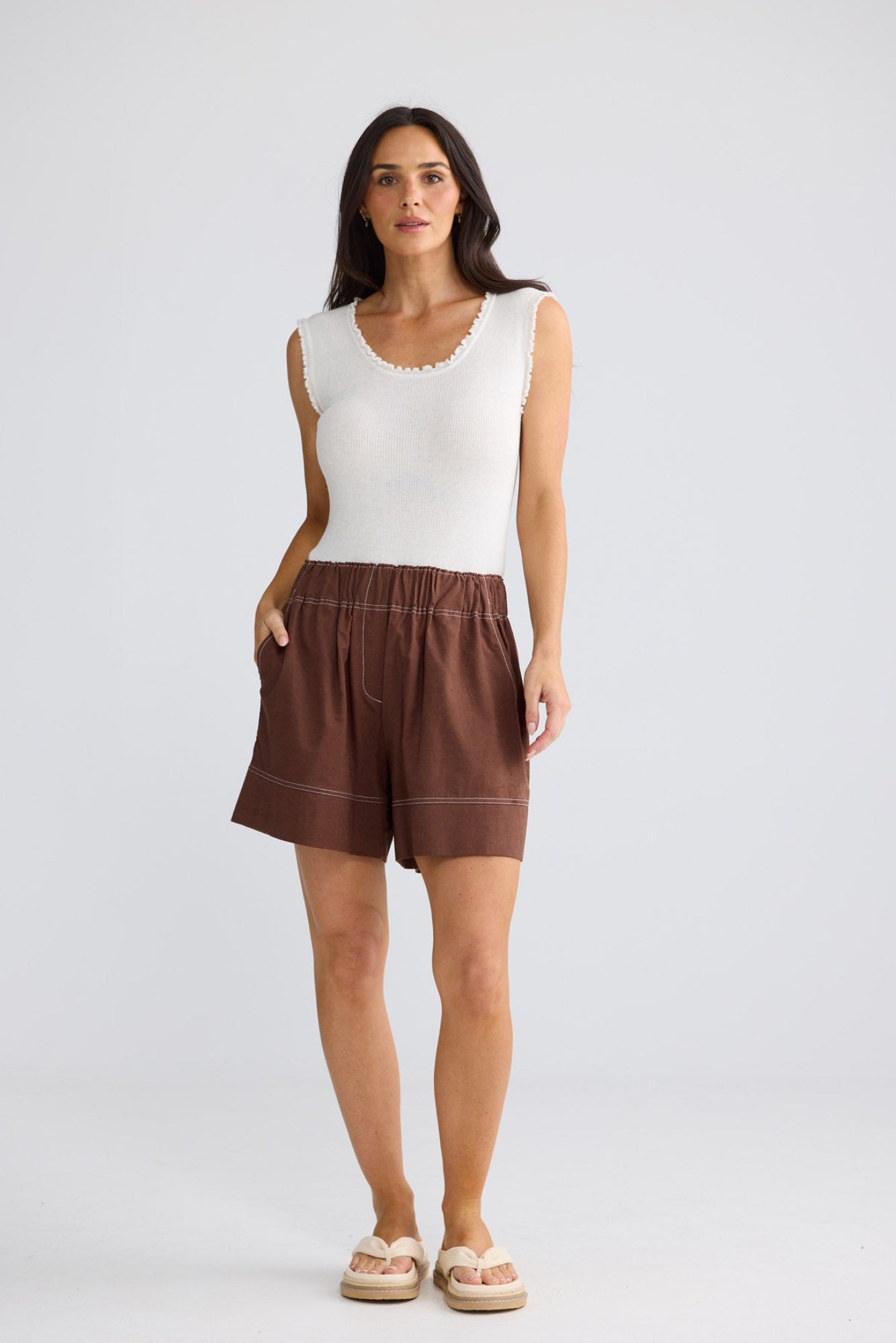 Model wearing Esplanade Short in Coffee by Brave + True, view 2.
