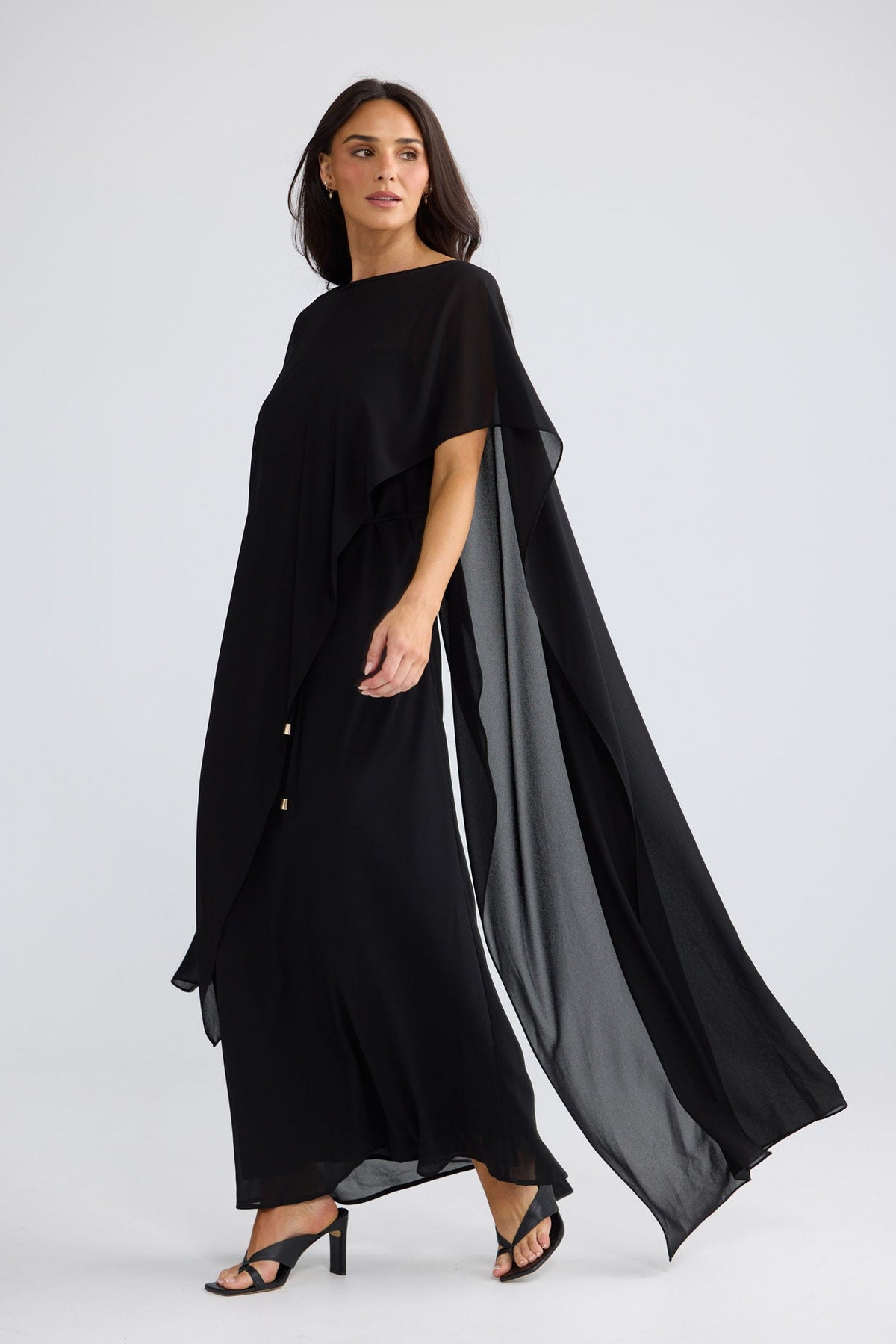 Model wearing Park Avenue Cape in Black by Brave + True, view 3.
