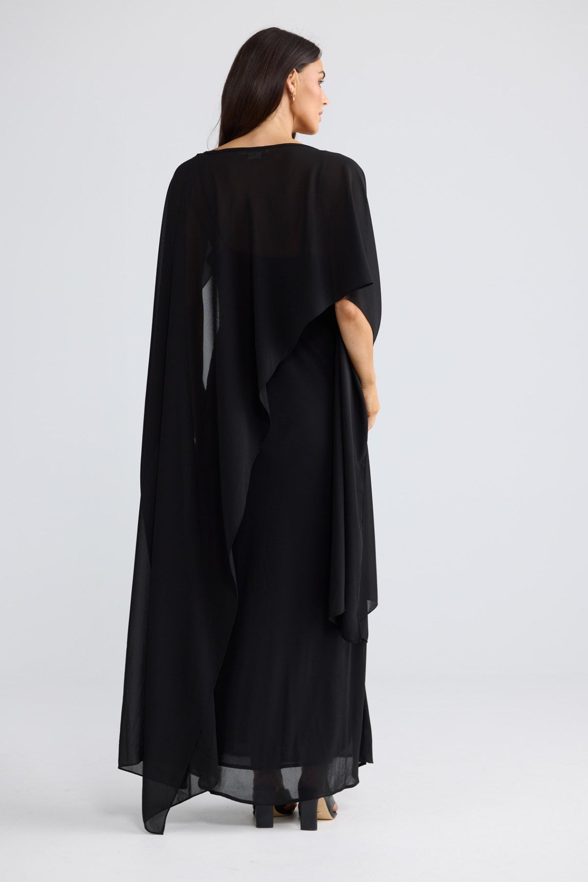 Model wearing Park Avenue Cape in Black by Brave + True, view 4.