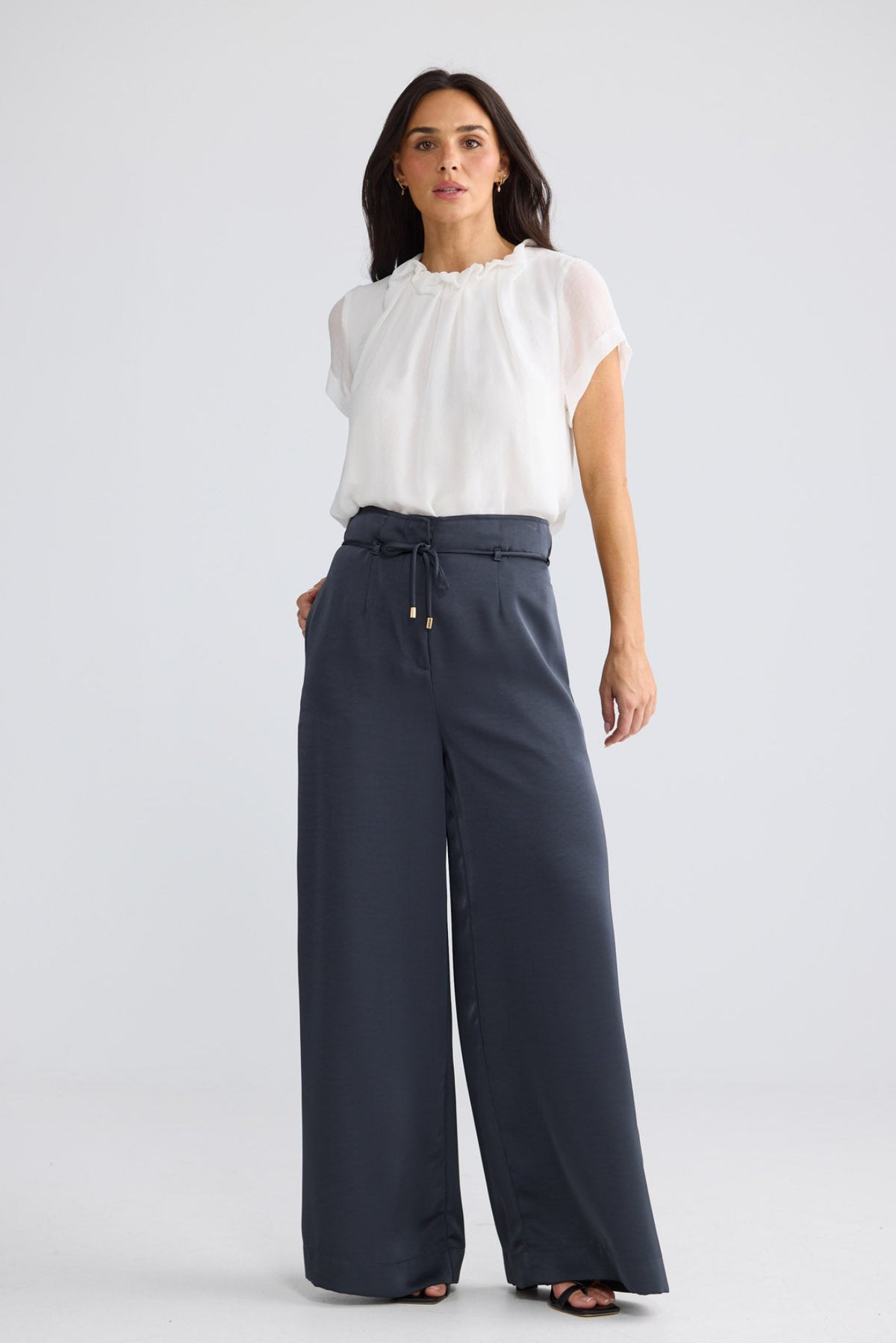 Model wearing Kensington Pant in Graphite by Brave + True, view 3.