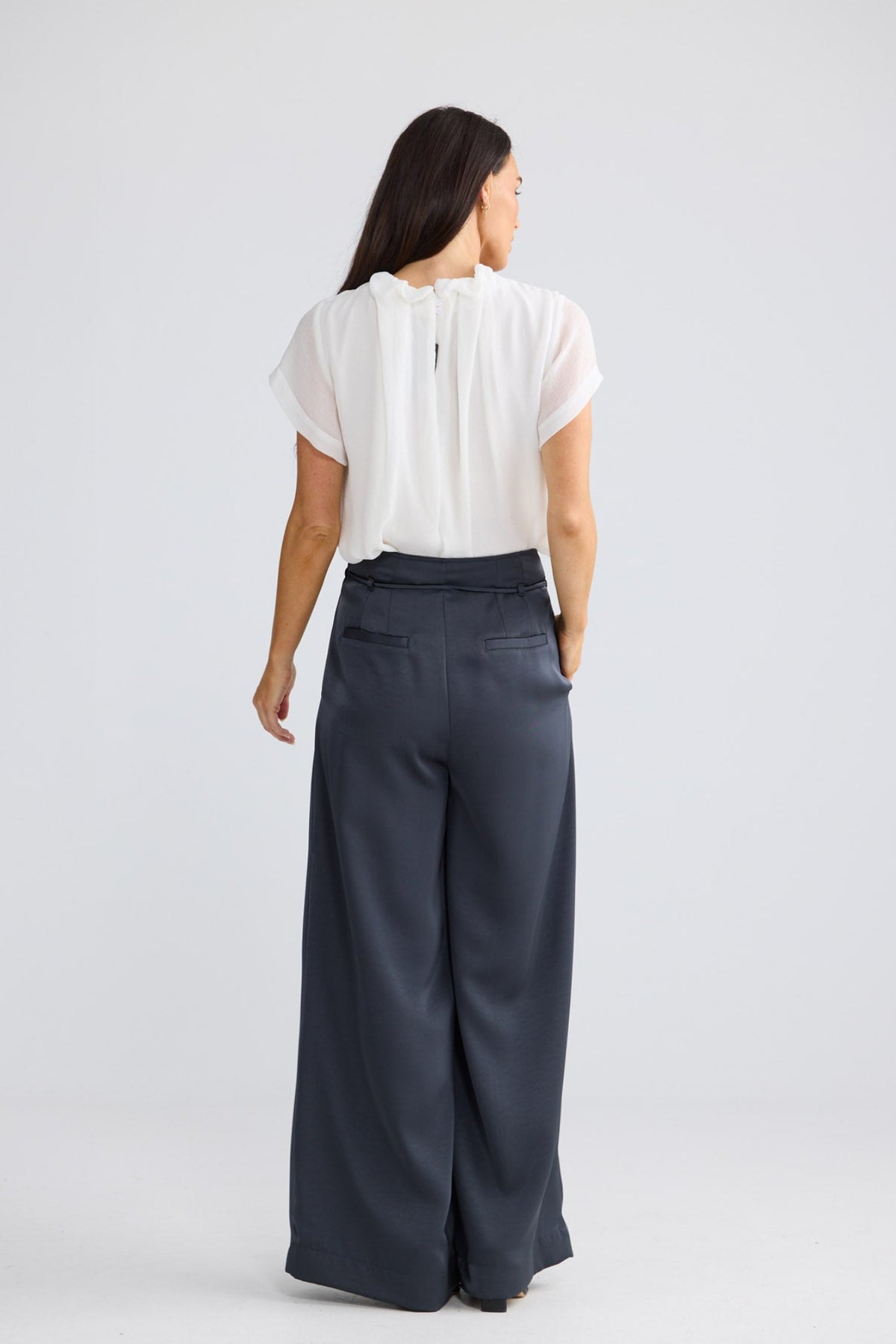 Model wearing Kensington Pant in Graphite by Brave + True, view 4.