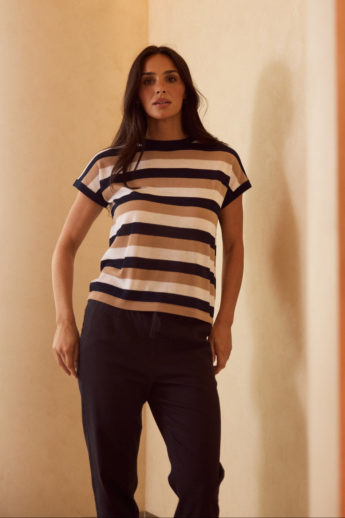 Model styling Rosalie Tee in Navy Multi Stripe by Brave + True, campaign lifestyle look.