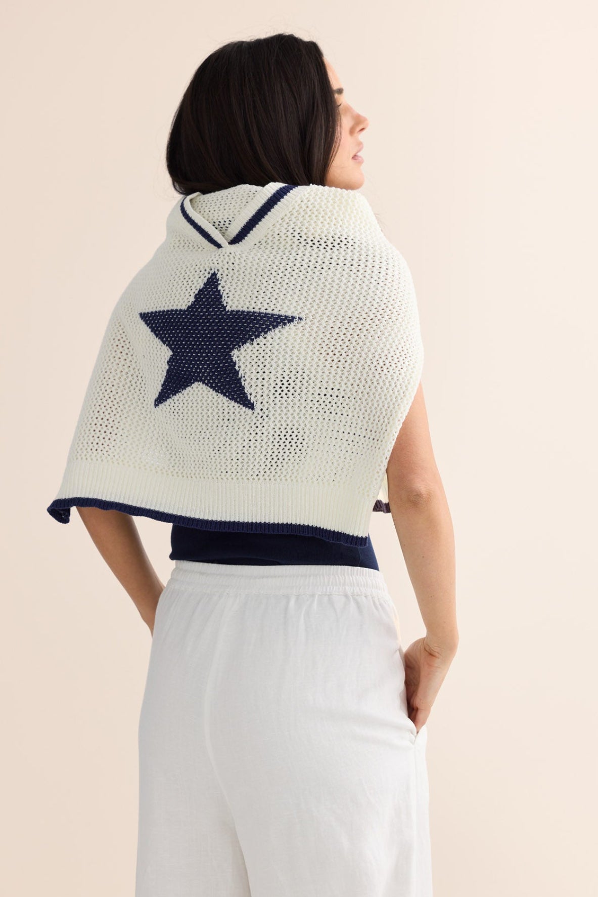 Model styling McKinney Knit in White W Navy by Brave + True, campaign lifestyle look.
