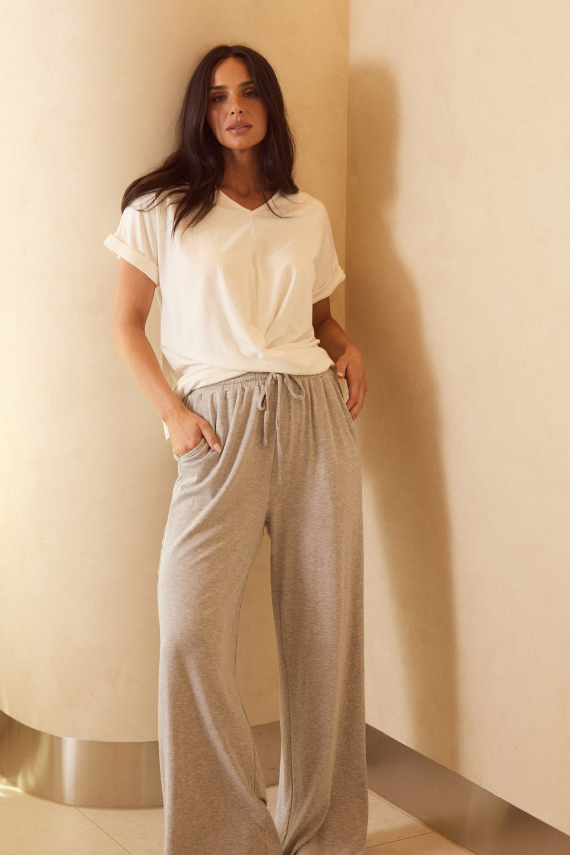 Model styling Rapture Tee in White by Brave + True, campaign lifestyle look 3.