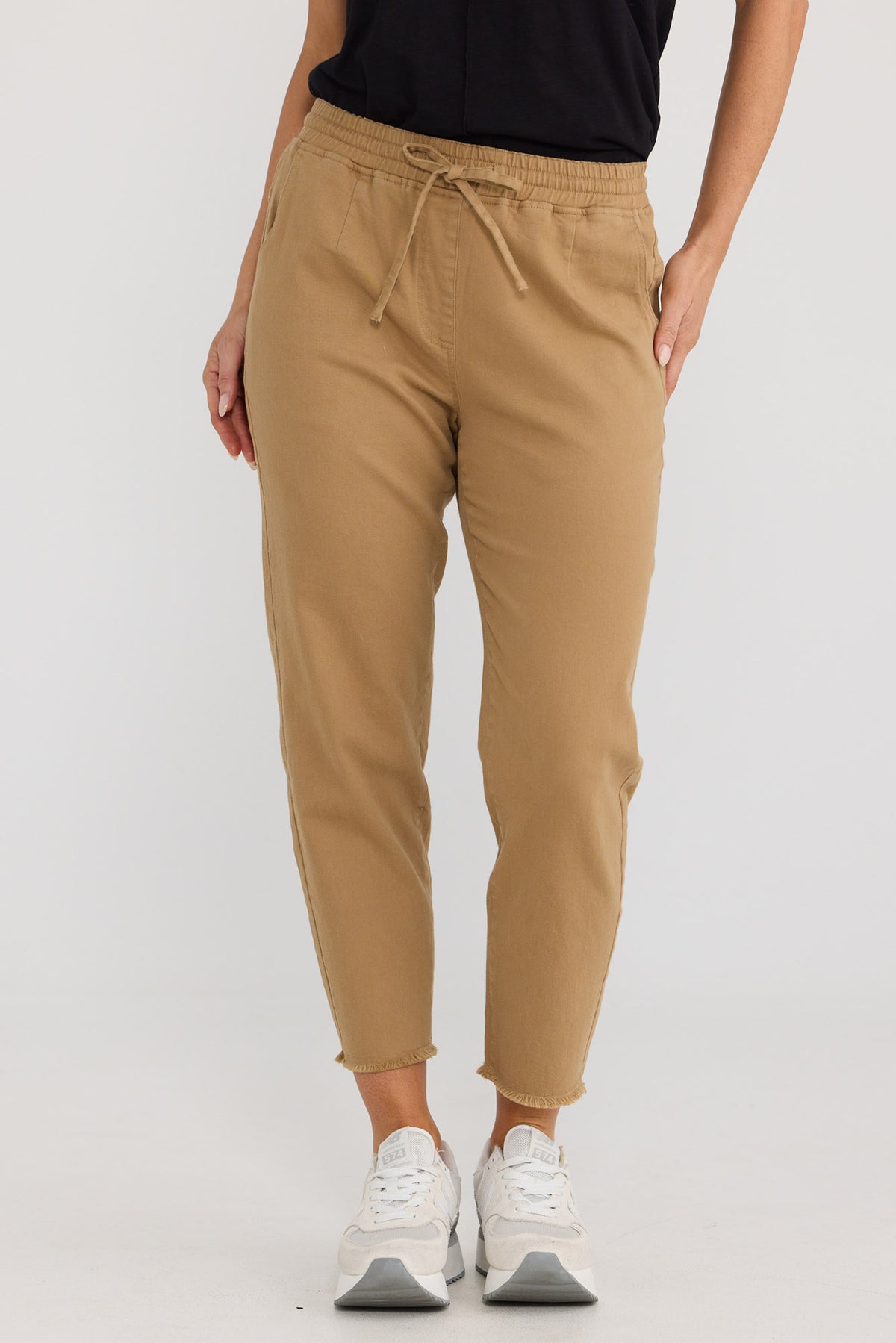 Model wearing Wayfarer Pant in Taupe by Brave + True, view 3.